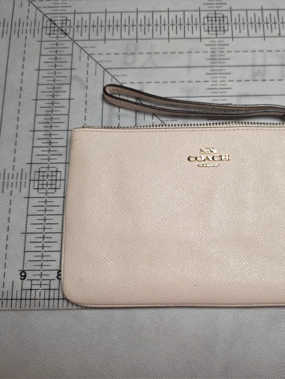 Coach Pebbled Leather Wristlet - Cream